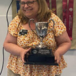 suzanne rieger winning an international speech contest
